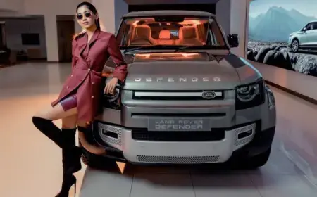 Lady standing with car